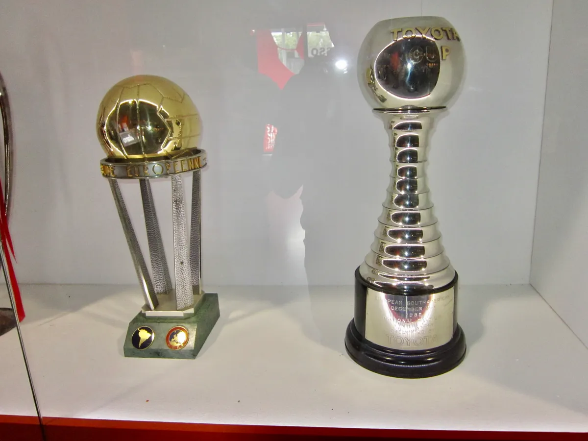 Trophies in a glass case in the San Siro museum, the part children stop for on a San Siro tour with kids